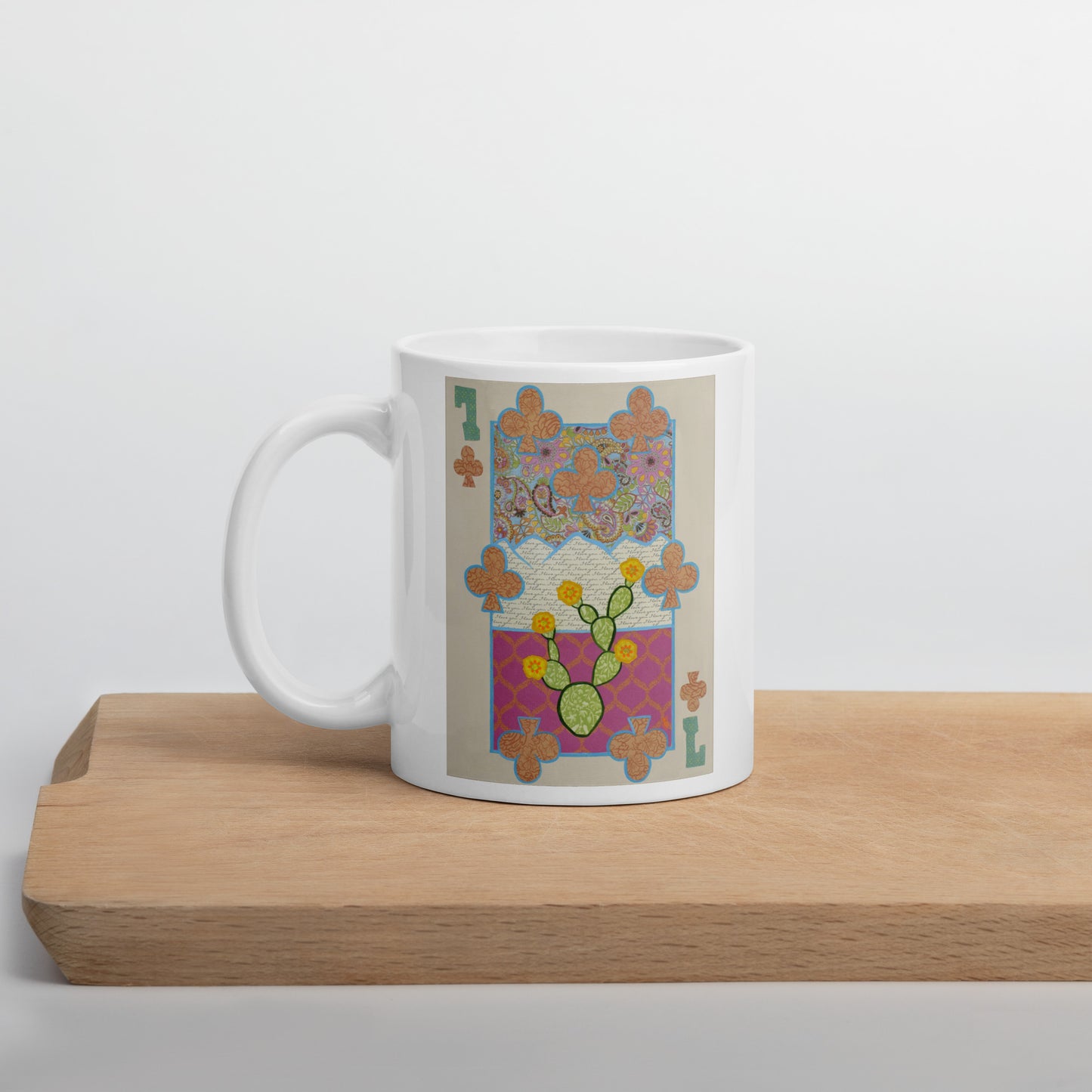 Seven of Clubs by Suzanne Villella | White glossy mug